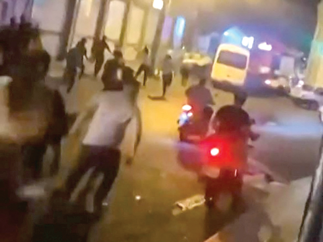 This image grab from a UGC video posted on Thursday, reportedly shows Iranian protesters clashing with security forces in the northern city of Rasht (AFP photo)