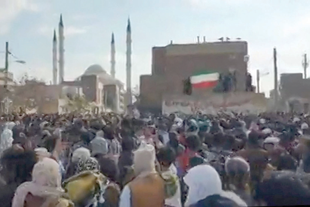This image grab from a UGC video made available on Friday, reportedly shows protesters marching after prayers (AFP photo)