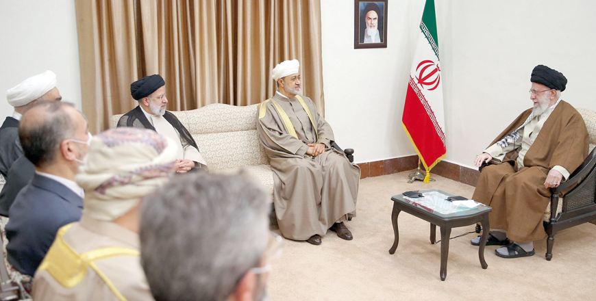 This handout photo provided by the office of Iran’s Supreme Leader Ayatollah Ali Khamenei shows him (right) during a meeting with Oman’s Sultan Haitham Bin Tariq Al Said (centre) in the presence of Iranian President Ebrahim Raisi  and other officials in Tehran, on Monday (AFP photo)