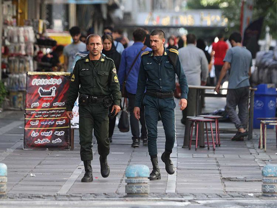 Iran’s police forces walk on a street during the revival of morality police in Tehran, Iran, on July 16 (AFP photo)