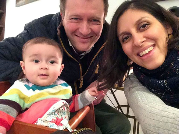 Nazanin Zaghari-Ratcliffe, pictured with her husband Richard and daughter Gabriella in 2016, has been given a temporary furlough from prison (AFP photo)
