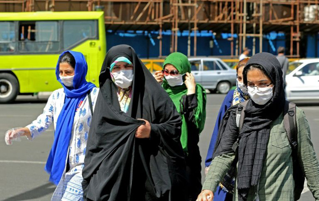 Iran has appealed to the public to avoid travel over the coming holiday weekend as its daily coronavirus death toll remains in triple figures (AFP photo)