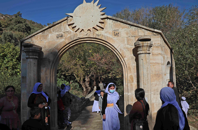 Iraqi Yazidi women visit the Lalish temple situated in a valley near Dahuk, 430 kilometres  northwest of the Iraqi capital, on Wednesday (AFP photo)