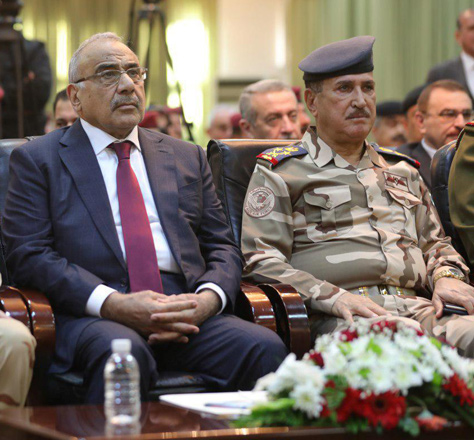 Iraqi Prime Minister Adel Abdul Mahdi (left) attends the celebration ceremony of the first anniversary of defeating Daesh in Baghdad, Iraq, December 10 (Reuters photo)