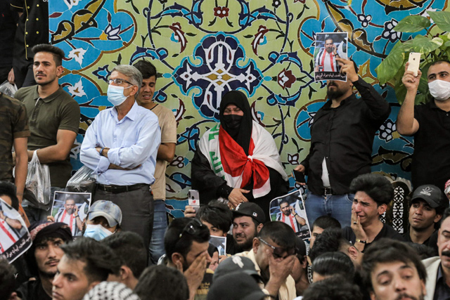 Mourners attend the funeral of assassinated Iraqi anti-government activist Ihab Al Wazni  at the Imam Hussein Shrine in the central holy shrine city of Karbala, on Sunday  (AFP photo)
