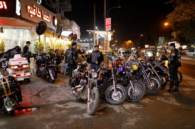 Members of the Iraq bikers, the first Iraqi biker group, gather outside a cafe in Baghdad, Iraq, on December 28, 2018 (Reuters photo)