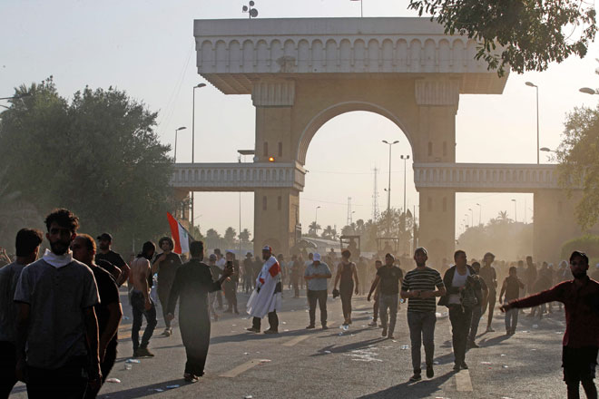 Supporters of Iraqi Shiite cleric Moqtada Sadr are pictured in the capital Baghdad's Green Zone on Monday (AFP photo)