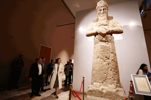 UNESCO chief Audrey Azoulay tours the national museum in Baghdad on Monday during a three-day visit to Iraq where many priceless cultural treasures have been damaged or destroyed during decades of conflict  (AFP photo)