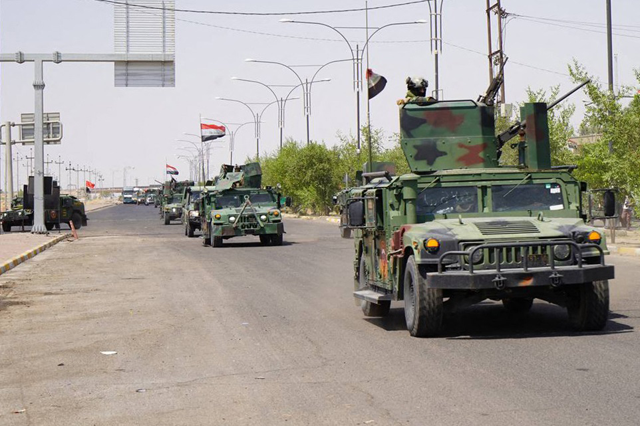 Iraqi security forces deploy in the multi-ethnic Iraqi city of Kirkuk on Sunday, after a curfew was lifted. Prime Minister Mohammed Shia Al Sudani imposed the curfew on the evening of Saturday (AFP photo)
