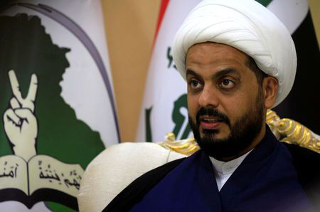 Qais Al Khazali, leader of the militant group Asaib Ahl Al Haq, speaks during an interview with Reuters in Najaf, Iraq, on Saturday  (Reuters photo)
