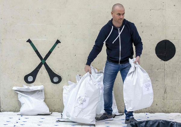 Counting gets under way at Nemo Rangers GAA club in Cork, southern Ireland, on Sunday (AFP photo)