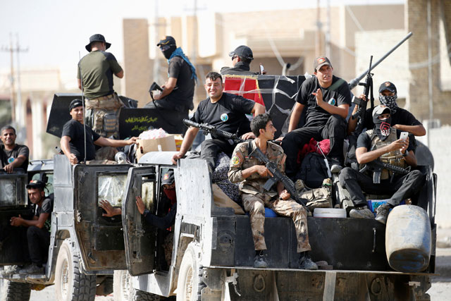 Iraqi counterterrorism forces gather in Fallujah, Iraq,  on Sunday (Reuters photo)