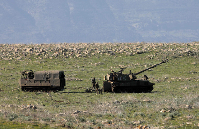 An Israeli military vehicle is pictured during a military drill in the Israeli-occupied Golan Heights, on Wednesday (AFP photo)