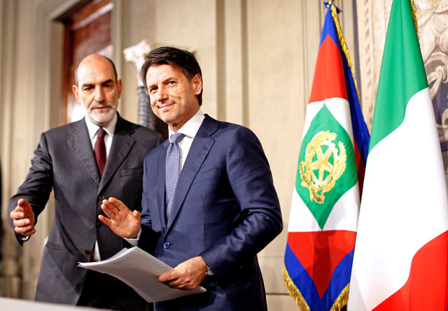 Newly appointed Italy Prime Minister Giuseppe Conte arrives to speaks with media after the consultation with the Italian President Sergio Mattarella at the Quirinal Palace in Rome, Italy, on Wednesday (Reuters photo)