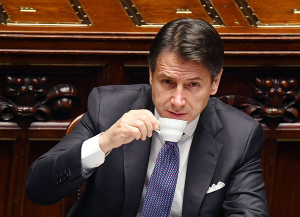Italy’s Prime Minister Giuseppe Conte drinks a cup of coffee on Monday during the new government confidence vote at the lower house of parliament in Rome (AFP photo)