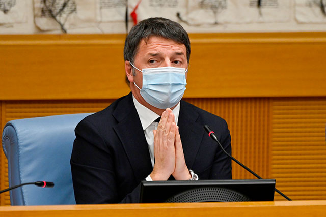 Italian current senator, former premier and head of the political party 'Italia Viva' (IV), Matteo Renzi gestures as he holds a press conference on Wednesday at the Italian Chamber of Deputies in Rome (AFP photo)