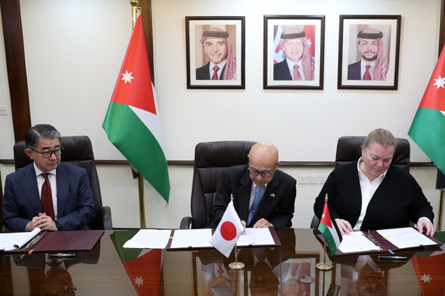 Minister of Planning and International Cooperation Zeina Toukan, Japan’s Ambassador to Jordan Okuyama Jiro, and Japan International Cooperation Agency Senior Vice President Shuhei Hara during the signing of documents for a soft loan at the Ministry of Planning and International Cooperation on Thursday  (Photo of the Mi Planning Ministry of Planning)