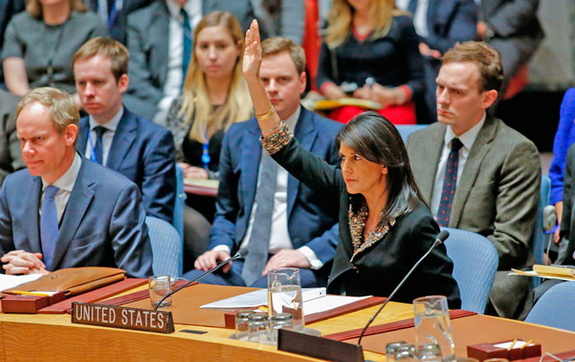US Ambassador to the UN Nikki Haley raises her hand as opposed to the vote on a draft resolution that would reject US President Donald Trump’s decision to recognise Jerusalem as the capital of Israel during a meeting on the situation in the Middle East including Palestine on Monday, at UN Headquarters in New York (AFP photo)