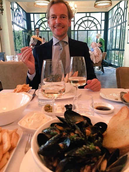 Belgian Ambassador in Amman Hendrik Van de Velde tries the famous mussels and fries in preparation for the Belgian Gastronomic Day this Friday (photo courtesy of the Belgian embassy in Amman)