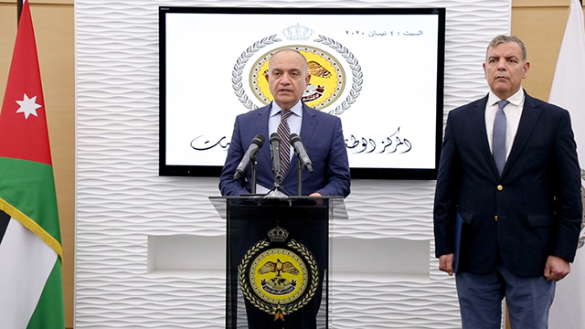 Minister of State for Media Affairs Amjad Adaileh speaks during a joint press briefing at the National Centre for Security and Crisis Management with Health Minister Saad Jaber (Petra photo)