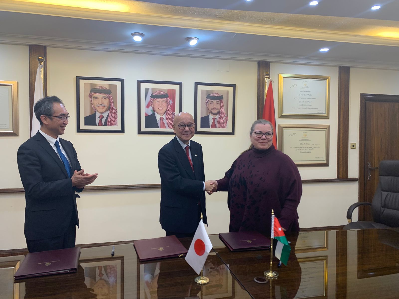 Minister of Planning and International Cooperation Zeina Toukan, Japan’s Ambassador to Jordan Okuyama Jiro, and Japan International Cooperation Agency Senior Vice President Ando Naoki during the signing of memoranda of understanding for a soft loan at the Ministry of Planning and International Cooperation on Thursday (Photo courtesy of Japanese embassy)