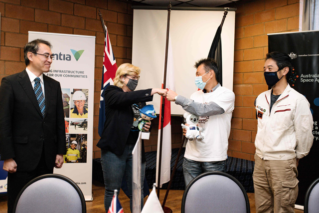 From left to right: Deputy head of mission, embassy of Japan in Australia Shutaro Ohmura, Australian Space Agency head Megan Clark, Masaki Fujimoto, deputy director general of the Japan Aerospace Exploration Agency (JAXA) and JAXA Senior Engineer Nakazawa Satoru attend a press conference in Woomera, South Australia, on Sunday (AFP photo)