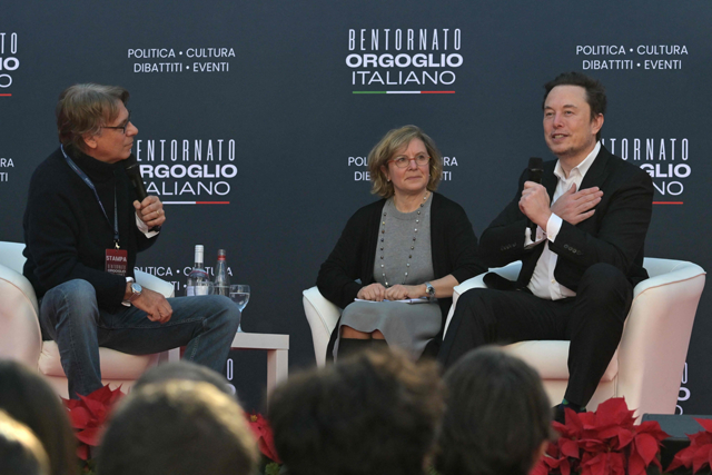 X (formerly Twitter) CEO Elon Musk (right) attends the Atreju political meeting organised by the young militants of Italian right- wing party Brothers of Italy (Fratelli d’Italia) on Saturday at the Sant’Angelo Castle in Rome (AFP photo)