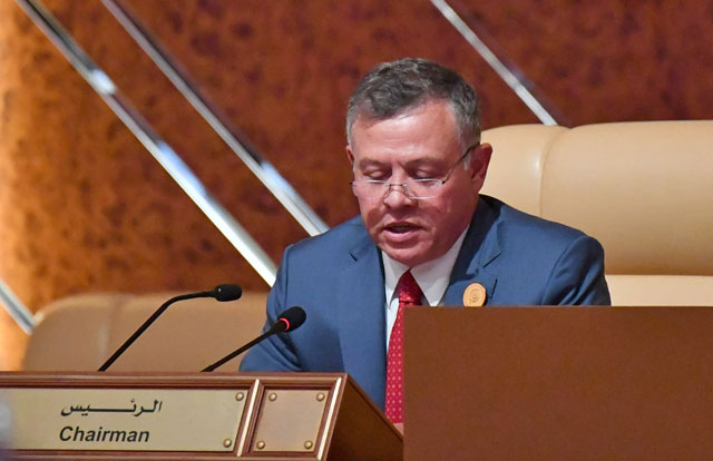 His Majesty King Abdullah delivers a speech inaugurating the Arab summit in Dhahran, Saudi Arabia, on Sunday (Photo courtesy of Royal Court)
