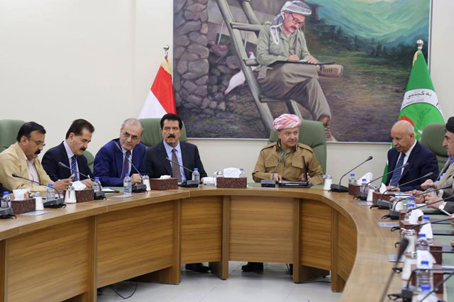 A picture taken on Monday shows Kurdish regional president, Massoud Barzani (centre), meets with Kirkuk provincial governor Najim Al Din Karim (3-left) and Kurdish political parties representatives in Kirkuk (AFP photo)