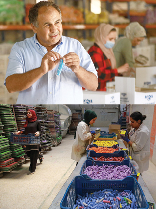 Salah Aloqbi, founder and owner of Jordan Chalk, speaks during an interview at the factory in Karak, around 120 kilometres south of the capital Amman on June 13, 2022. Below: Workers package finished chalk into boxes at the Jordan Chalk company in Karak, around 120 kilometres south of the capital Amman, on June 13, 2022 (AFP photos by Khalil Mazraawi).  