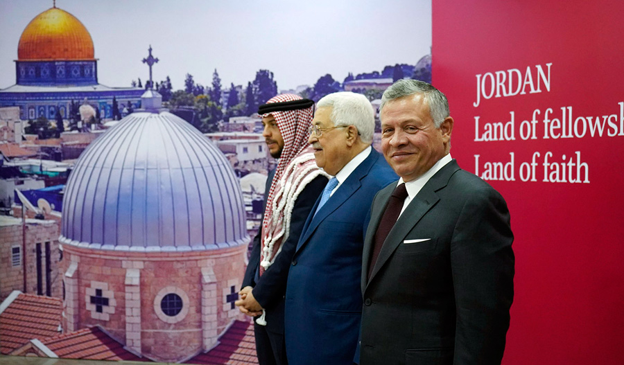 His Majesty King Abdullah, HRH Crown Prince Hussein and Palestinian President Mahmoud Abbas receive visiting Muslim and Christian figures taking part in the  ‘Jordan Land of Faith and Fellowship ‘ ceremony at the Al Hussein Cultural Centre in Amman on Tuesday (Photo courtesy of Royal Court)