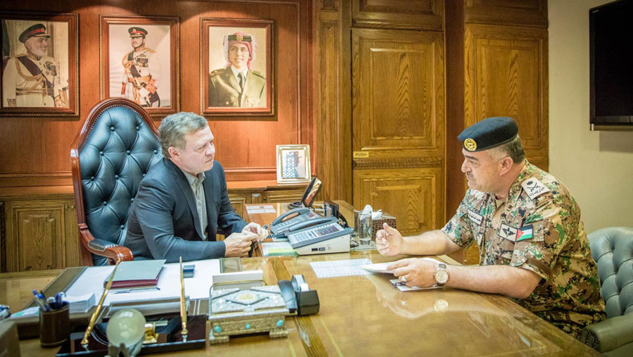His Majesty King Abdullah meets with Chairman of the Joint Chiefs-of-Staff Maj. Gen. Mahmoud Freihat at the army headquarters on Thursday (Photo courtesy of Royal Court)