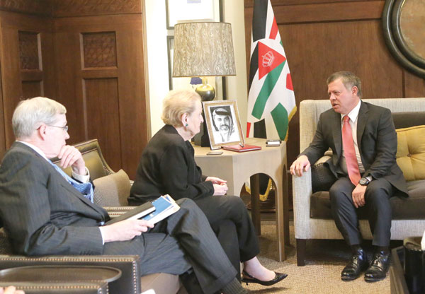 His Majesty King Abdullah holds talks with former US secretary of state Madeleine Albright, the head of a delegation from the US-based Atlantic Council, in Amman, on Monday (Photos courtesy of Royal Court)