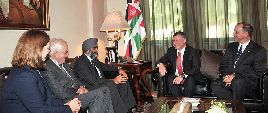 His Majesty King Abdullah receives a ministerial delegation from Canada on Sunday (Photo courtesy of Royal Court)