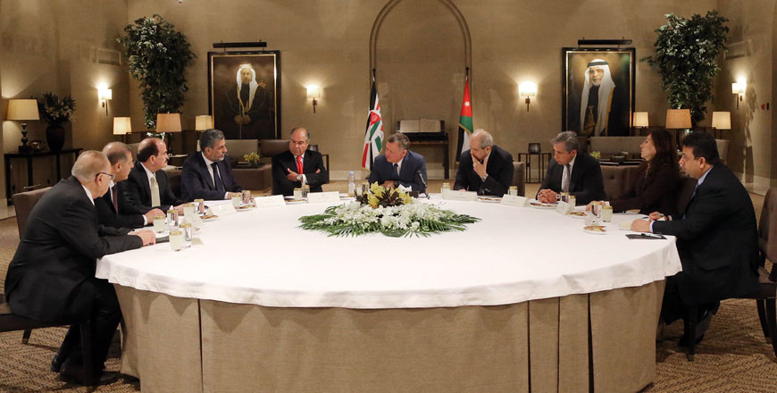 His Majesty King Abdullah meets with the president and members of the Independent Election Commission and senior  officials  on Sunday  (Photo courtesy of Royal Court)