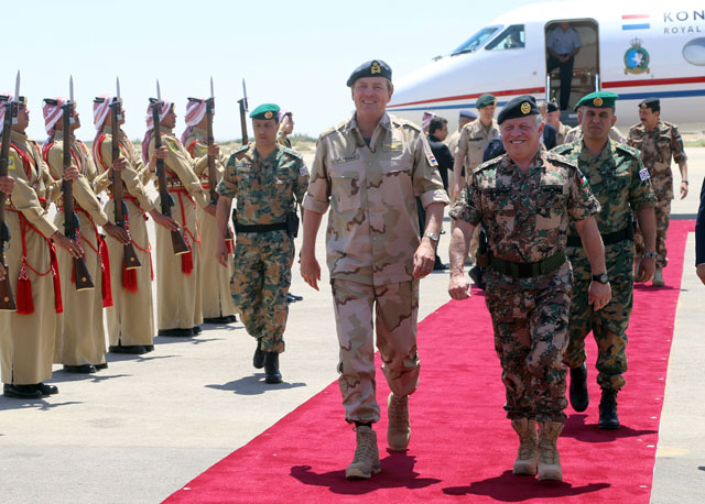 His Majesty King Abdullah and King of the Netherlands Willem-Alexander review the guard of honour in Amman on Thursday  (Photo courtesy of Royal Court)