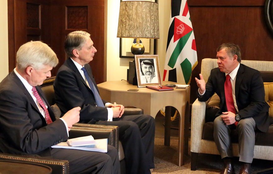 His Majesty King Abdullah holds talks with UK Foreign Secretary Philip Hammond in Amman on Monday (Photo courtesy of Royal Court)