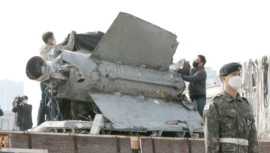 The debris of a three-metre-long and two-metre-wide piece, which it identified as a North Korean SA-5 missile according to South Korea's military, is seen at the defence ministry in Seoul on Wednesday (AFP photo)
