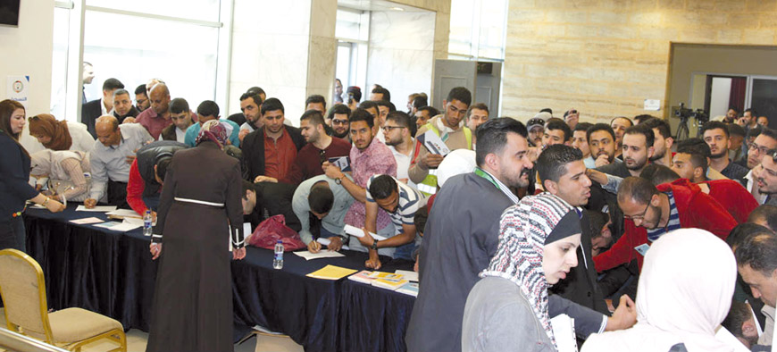 Jordanian job seekers attend the first Jordanian-Kuwaiti employment forum in Amman on Saturday (Petra photo)