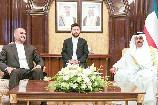 A photo provided by the Kuwaiti news agency KUNA on Wednesday shows Kuwait's Prime Minister Sheikh Ahmad Nawaf Al Ahmad Al Sabah (right) meeting with Iran's Foreign Minister Hossein Amir-Abdollahian, in Kuwait City (AFP photo)