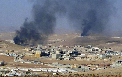 In this August 2, 2014, file photo, smoke billows from the Lebanese town of Arsal, a Sunni Muslim town near the Syrian border in eastern Lebanon (AP photo)