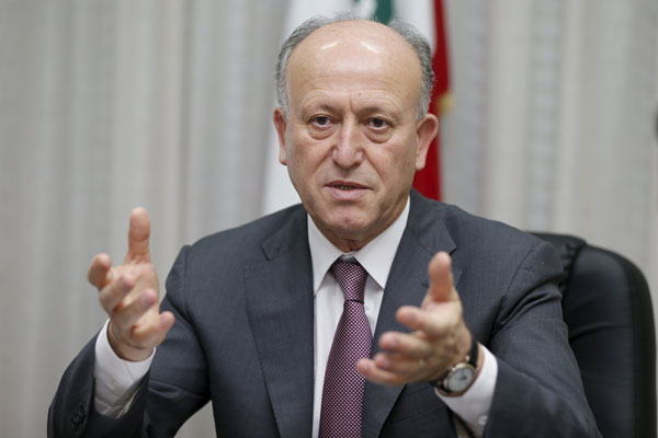 Lebanon’s Justice Minister Ashraf Rifi speaks in his office in Beirut in this May 8, 2014 file photo. Rifi on Sunday announced his resignation, blaming political rivals Hizbollah and their allies for the country’s political crisis, which has seen it without a president for 21 months and paralysed state institutions (Reuters photo)