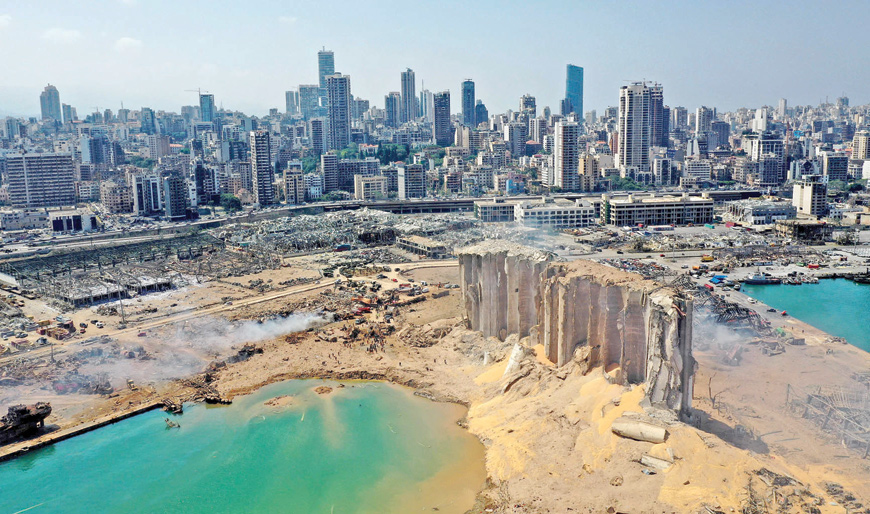In this file photo taken on August 05, 2020 an aerial view shows the massive damage at Beirut Port's grain silos and the area around it, one day after a massive explosion hit the heart of the Lebanese capital (AFP photo)