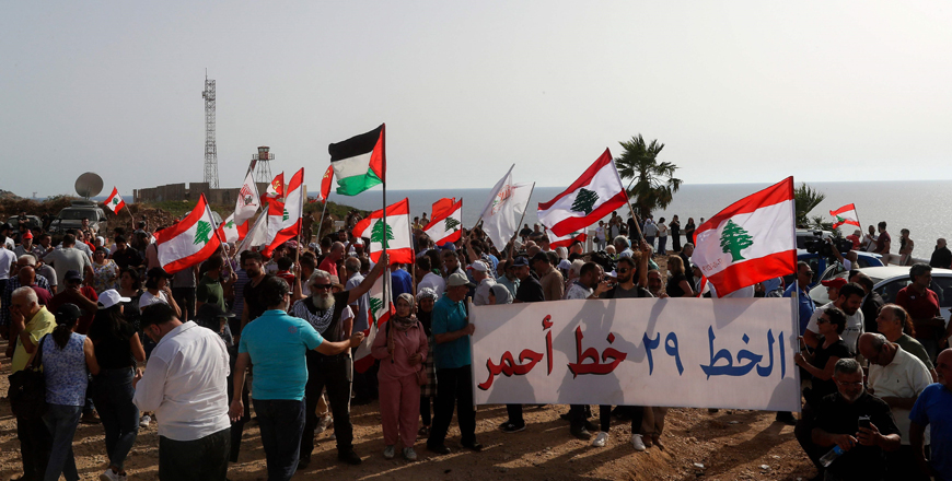Lebanese protesters take part in a demonstration at the Lebanese southernmost border area of Naqoura, on Saturday, days after Israel moved a gas production vessel into an offshore field, a part of which is claimed by Lebanon (AFP photo)