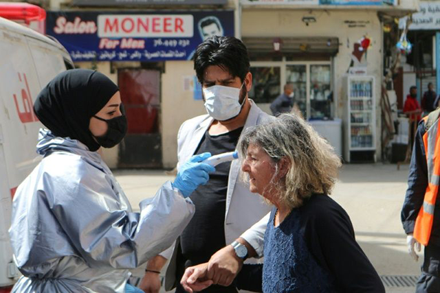 Aid groups have warned that hundreds of thousands of Palestinian and Syrian refugees living in Lebanon's overcrowded camps are the most vulnerable amid the COVID-19 pandemic (AFP photo)