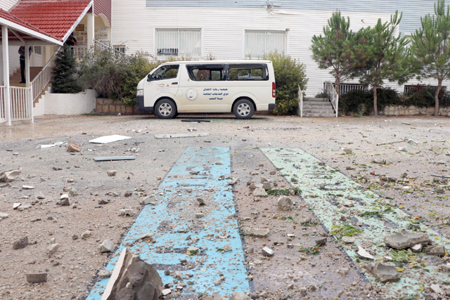 A photo taken on Sunday, shows the damage following Israeli shelling on a special needs school in the southern Lebanese border village of Aita Al Shaab (AFP photo)