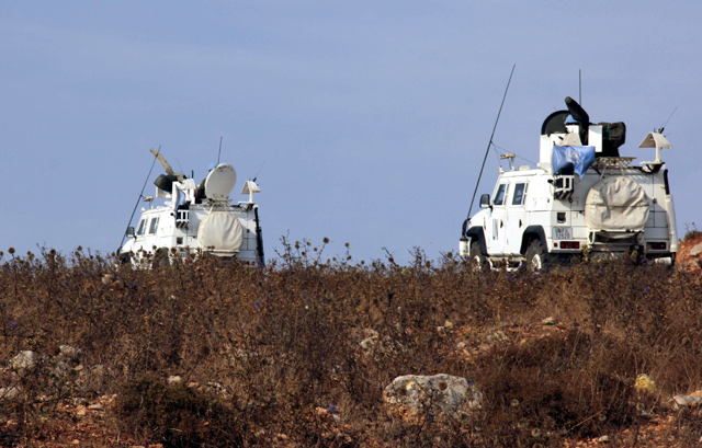 A convoy of the United Nations peacekeeping force (UNIFIL) patrols in the vicinity of the Kfar Kila village in southern Lebanon, after reports of clashes in the Lebanese-Israeli border area, on Monday (AFP photo)