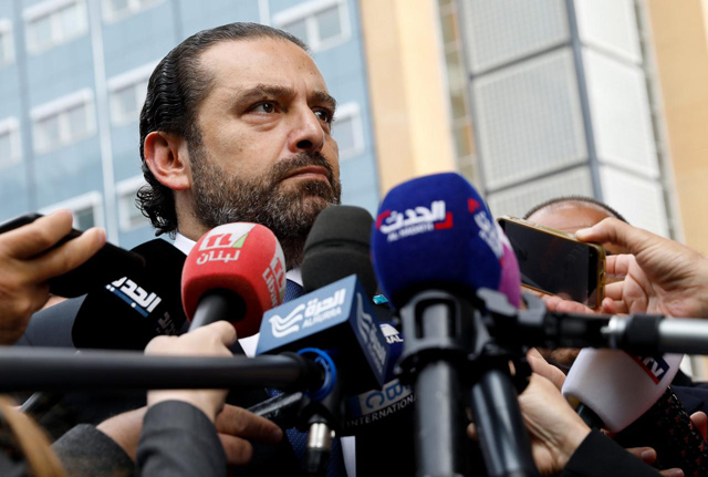 Lebanese Prime Minister-designate Saad Al Hariri speaks to the media in front of the Special Tribunal for Lebanon ahead of the closing arguments in the trial of Lebanon's Rafik Al Hariri alleged killers in the Hague,The Netherlands, on September 11 (Reuters photo)