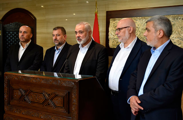 This handout photo provided by the Lebanese Parliament press office shows Hamas Chief Ismail Haniyeh (centre) giving a press statement after meeting with the parliament speaker at the Ain Al Tineh Palace in Beirut on Wednesday (AFP photo)