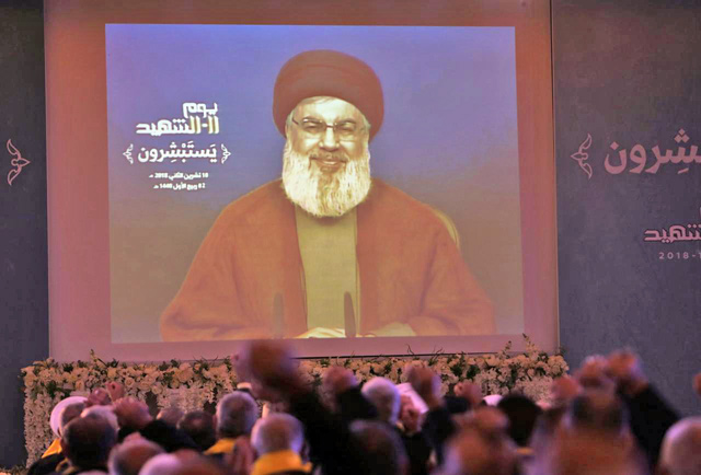 Hizbollah leader Sayyed Hassan Nasrallah addresses his supporters via a screen in Nabatiyeh, Lebanon, on November 10, 2018 (Reuters photo)